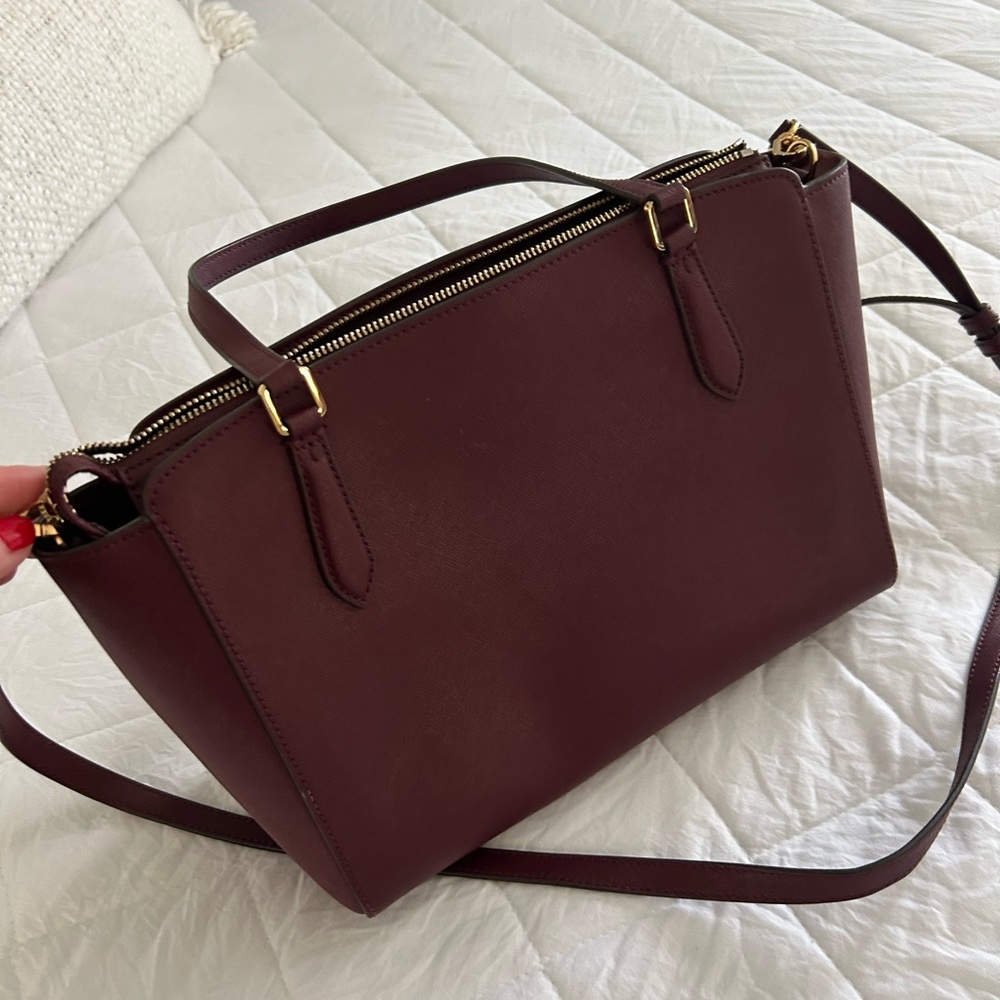 Tory Burch large burgundy leather tote.